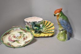 A selection of 20th century ceramics including parrot figure and a peacock bowl