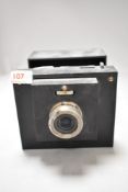 A unmarked camera in a protective cube