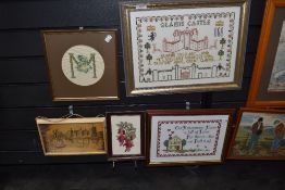 A selection of embroidery including poems and monogram