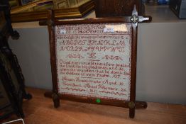 A Victorian needle work sampler having alphabet with poem, by Susan Braithwaite 1851 from
