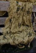 A vintage cruel work style bed throw having floral pattern