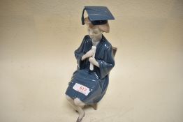 A Lladro figurine, Girl graduate, 5199 impressed to underside.