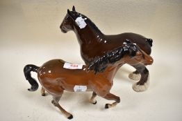 A Beswick Horse, brown gloss finish, with front leg raised, also included is a Royal Doulton Shire