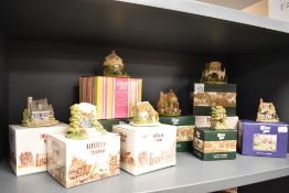 A collection of Lilliput Lanes to include; Cosy corner, Tree tops and sugar mouse.