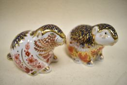 Two Royal Crown Derby studies,both beavers, LTD Edition 4633/5000 with hexagonal stopper and similar