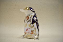 A Royal Crown Derby Platapus Study having silver stopper.