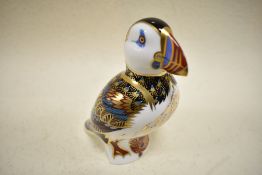 A Royal Crown Derby Brown Puffin study having silver stopper.