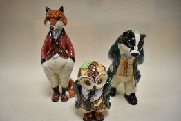 Three Cinque ports pottery figurines to include a Fox, Badger and Owl.
