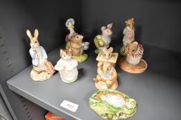 A collection of ten Royal Albert and Beswick Beatrix Potter studies, to include; Timmie Willie