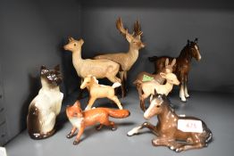 A collection of Beswick studies to include Donkey, Fox and deer.