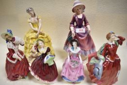 A selection of figures including Coalport Breeze and Penelope, Royal Doulton Blithe Morning,