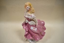 A Franklin Mint Cinderella figurine decorated with 22 carat gold, with certificate.