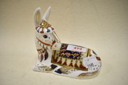 A Royal Crown Derby Donkey study having gold stopper.