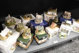 A selection of Lilliput Lanes to include; Yam Yat farm, Pillar cottage and Holy Island hideaway.