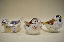 Three Royal Crown Derby bird figurines including Willow Tit with gold stopper and Long Tailed Ti