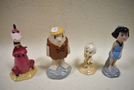 A collection of Flintstones figurines, to include Beswick, Dino and a Bamm-Bamm Rubble.
