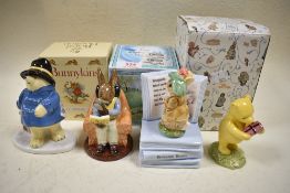 A Beatrix potter music Frederick Warne music box for Benjamin Bunny boxed, with Royal Doulton Pooh
