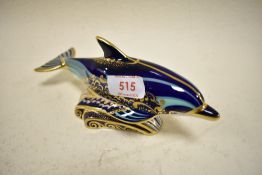 A Royal Crown Derby bottlenose dolphin study,having silver stopper.