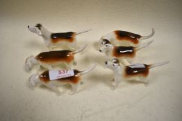 A selection of six Beswick Fox Hounds in various poses.