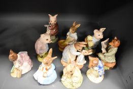 A collection of Ten Royal Albert and Beswick Beatrix Potter studies, to include; Foxy reading,