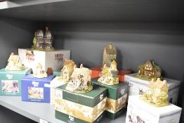 A collection of Lilliput lanes to include; The Toy box, Fruits of the Sea and The Priests house.