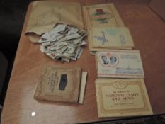 A collection of vintage Cigarette Cards, loose and in albums