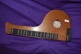 A traditional three string Dulcimer , labelled GEWA, model 505195