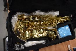 A Sonata alto saxophone and case, as new
