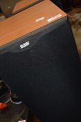 A pair of Bower and Wilkins DM602 speakers , and two speaker stands