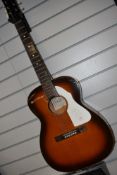 A vintage EKO acoustic guitar