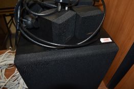 A BK electronics sub woofer and five Bose surround sound satellite type speakers