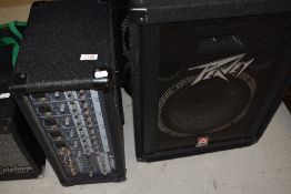 A Peavey XR560 powered mixer amp , pair of peavey speakers and poles