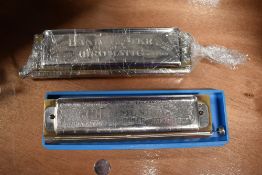 Two Chromatic harmonicas, Hohner and Bandmaster