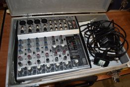 A Behringer UB1202FX Eurorack mixer, case power supply etc