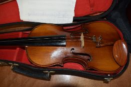 A traditional violin having 14inch two piece back, unlabelled with similar bow and hard case