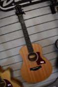 A 2011 Taylor GS Mini, serial number 2108221173, in original padded bag. Pickup has been removed but