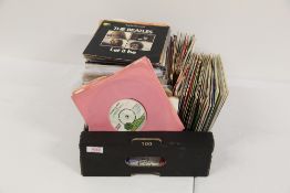 A mixed bag of approximately one hundred and fifty seven inch singles - covering 1960's to 1980'
