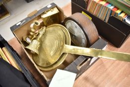 A selection of brass wares including large strainer