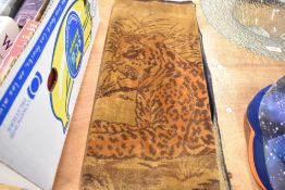 A mid century tiger printed wall throw