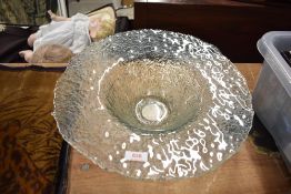 A modern frosted glass fruit bowl