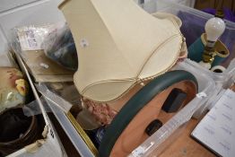 A selection of lamp shades and ceramics