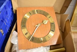 A mid century wall mounted clock by Junghans