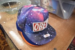 Three mens baseball caps including new era and OBEY