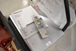 A Panasonic DVD recorder with remote