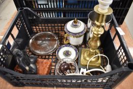 A selection of ornaments and brass lamp