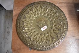 20th century Turkish brass plate having ornate chase work decoration marked Naki Filali Ahmed