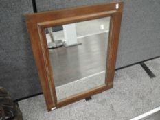 An Edwardian oak framed over mantel mirror