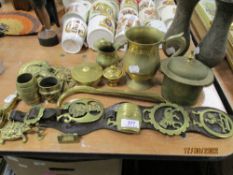 A selection of brass wares including Indian chase work vase, horse brasses and shoe horn