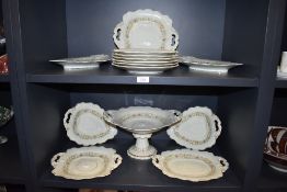 A late Victorian W. Ridgway Hanley dinner service having enamelled floral design 1096.