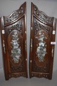 A pair of Chinese mirrored wooden panels inlaid with mother of pearl vase design